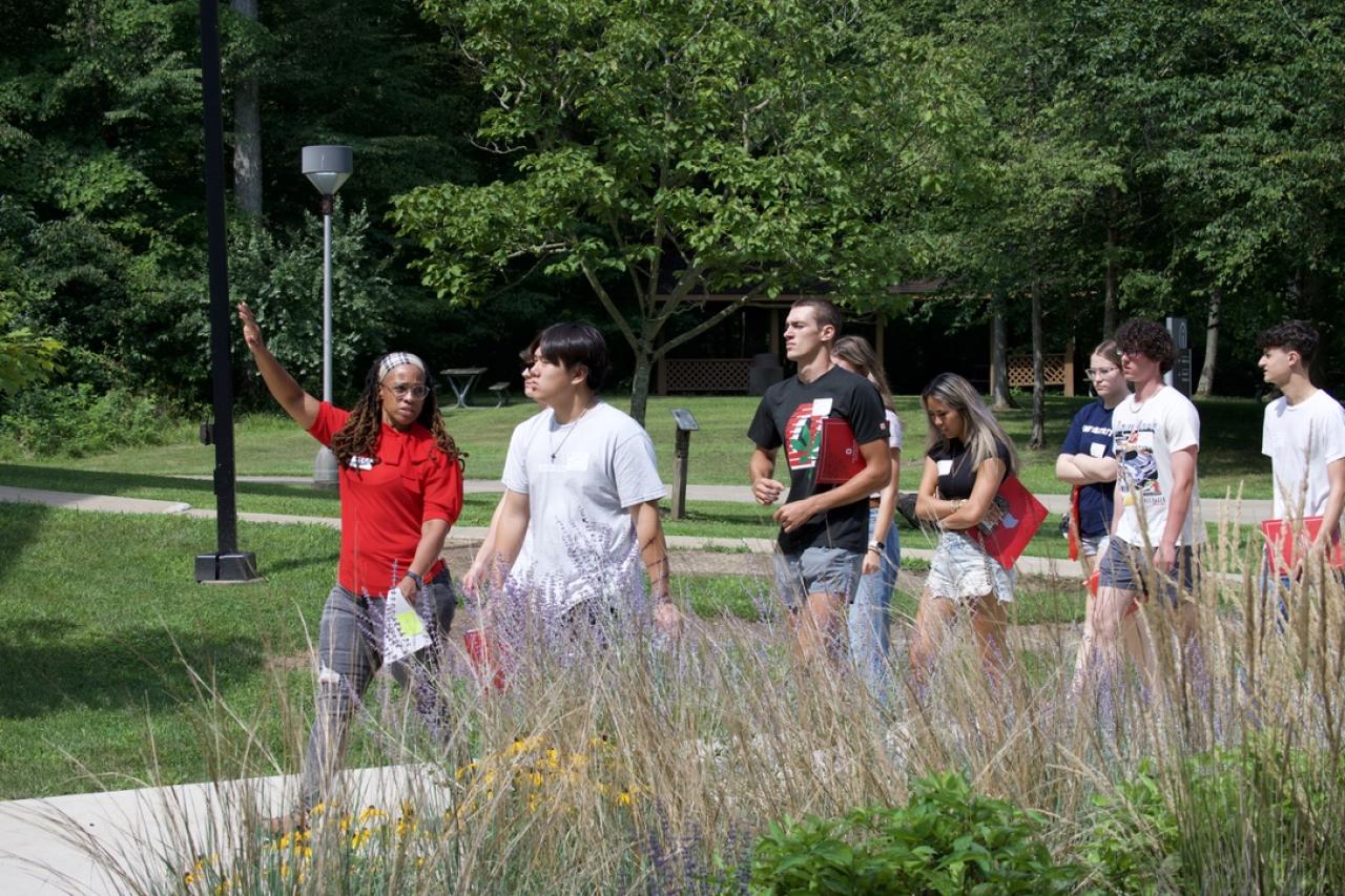 students walking outdoors on campus