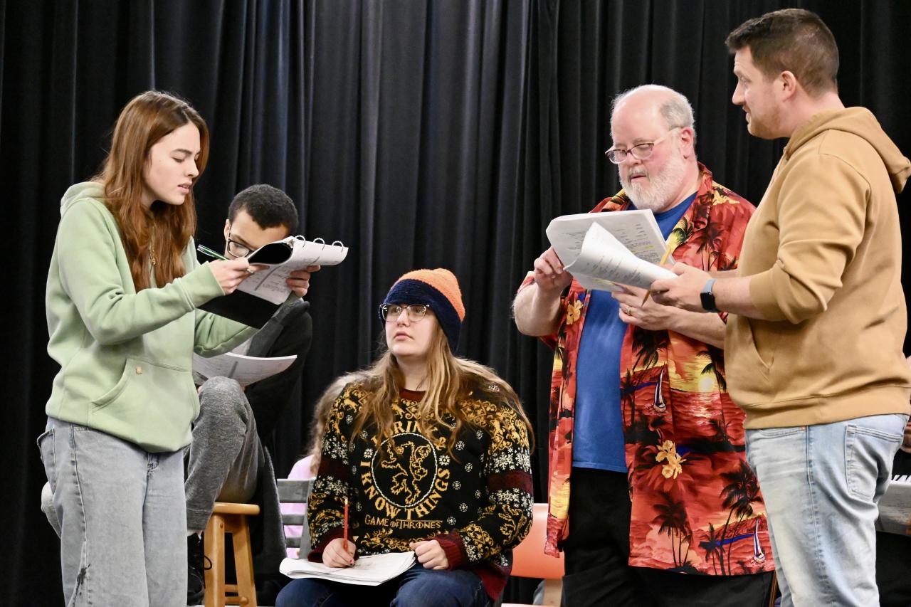 theatre performance on stage with four actors