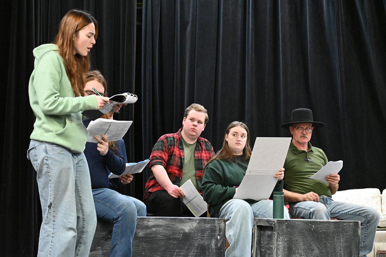 theatre performance on stage with five actors