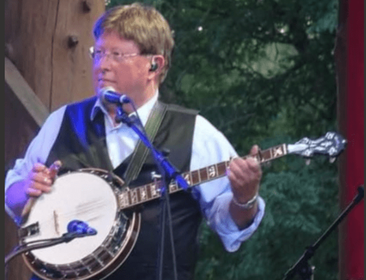 Scott Osborne posing with a banjo