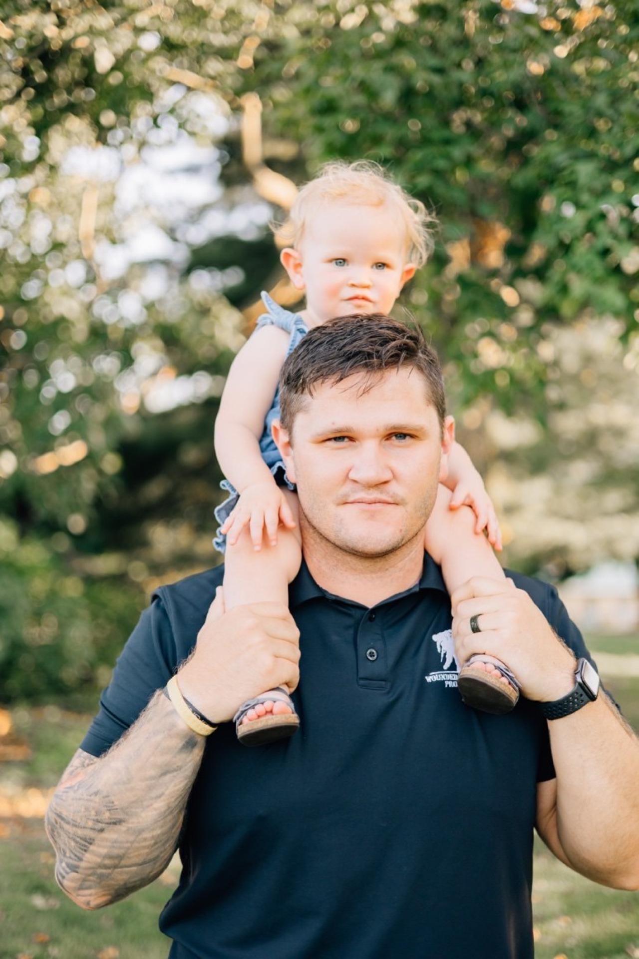 A.J. Mooney in Army with daughter