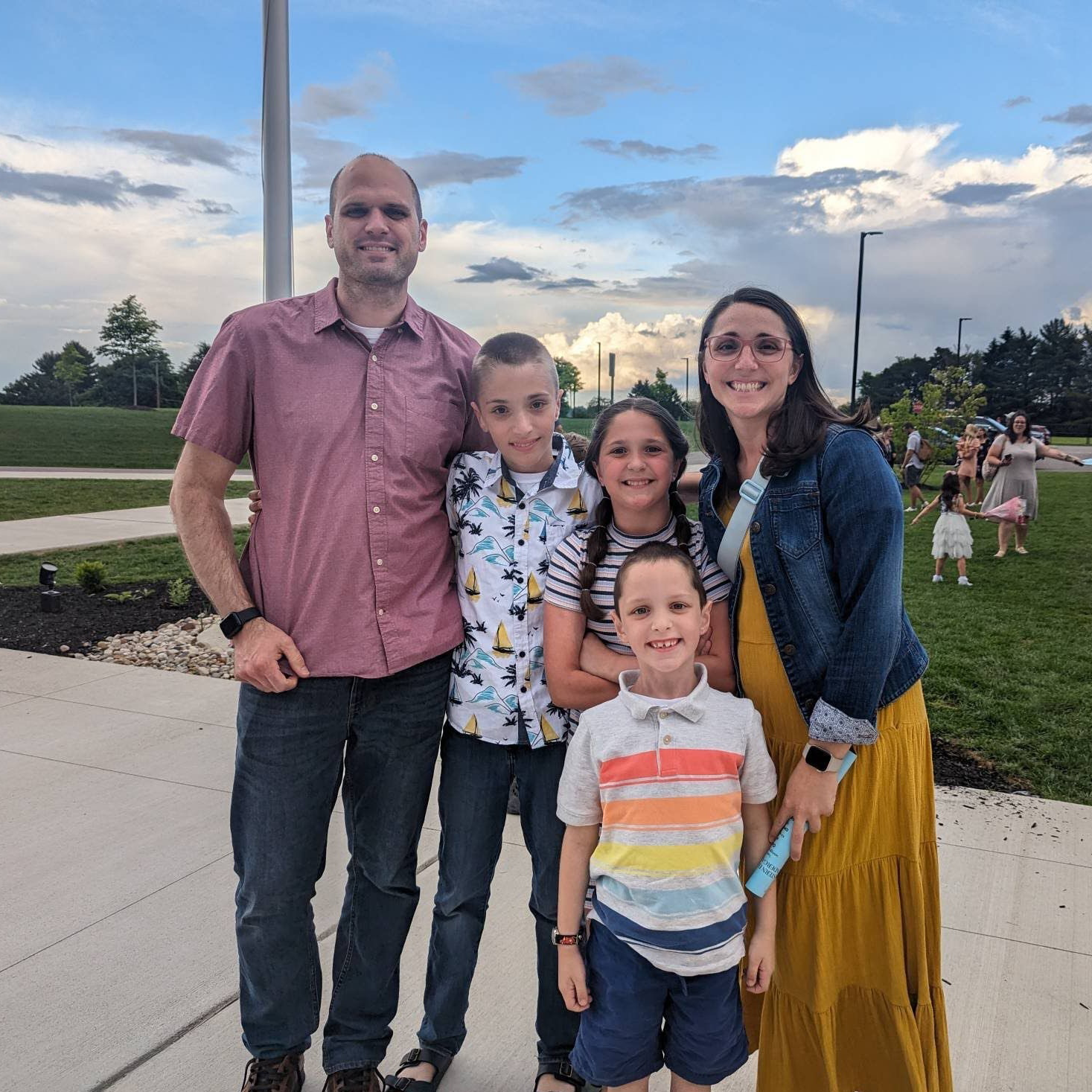 Andrew Mueller, his wife, two sons and daughter