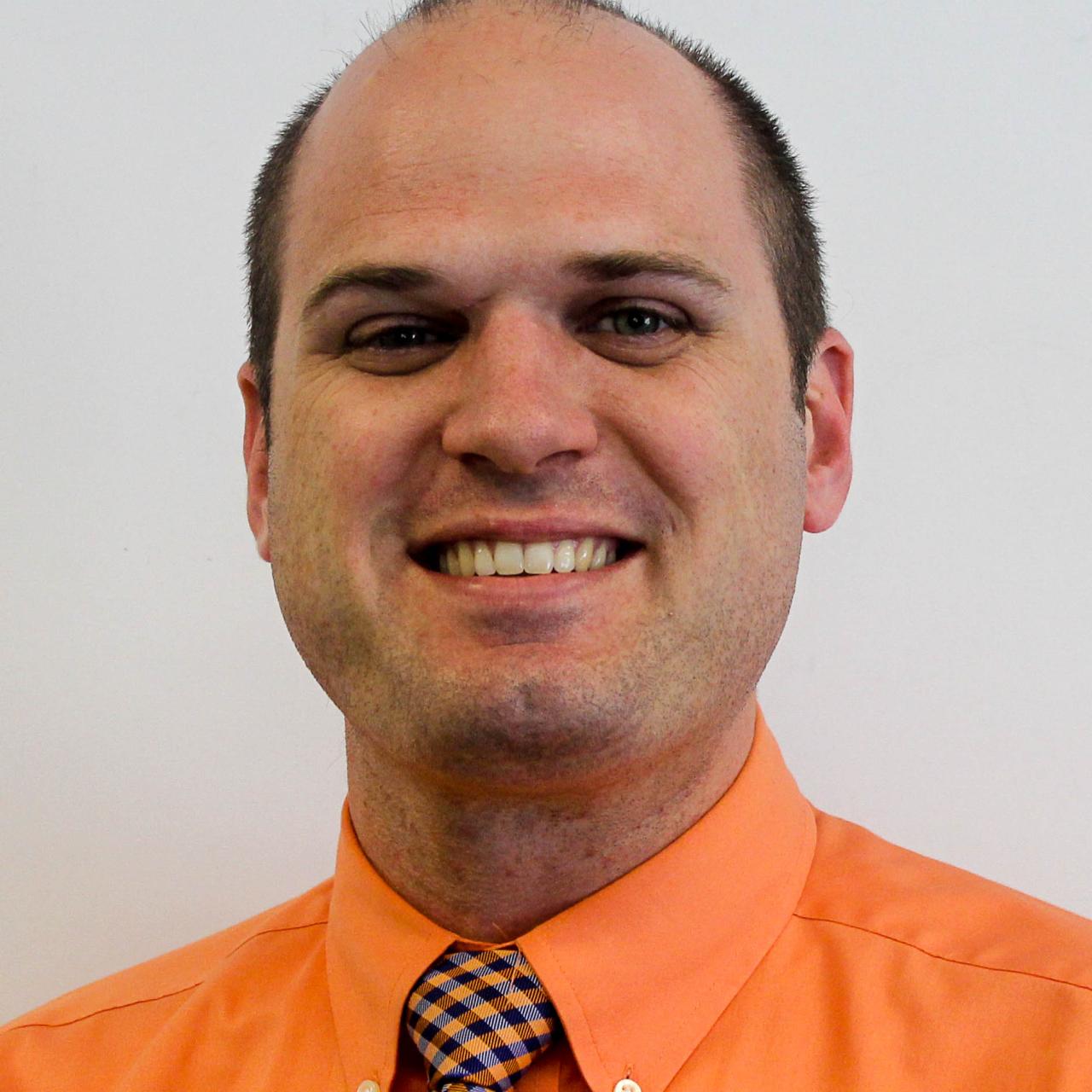 headshot of Andrew Mueller