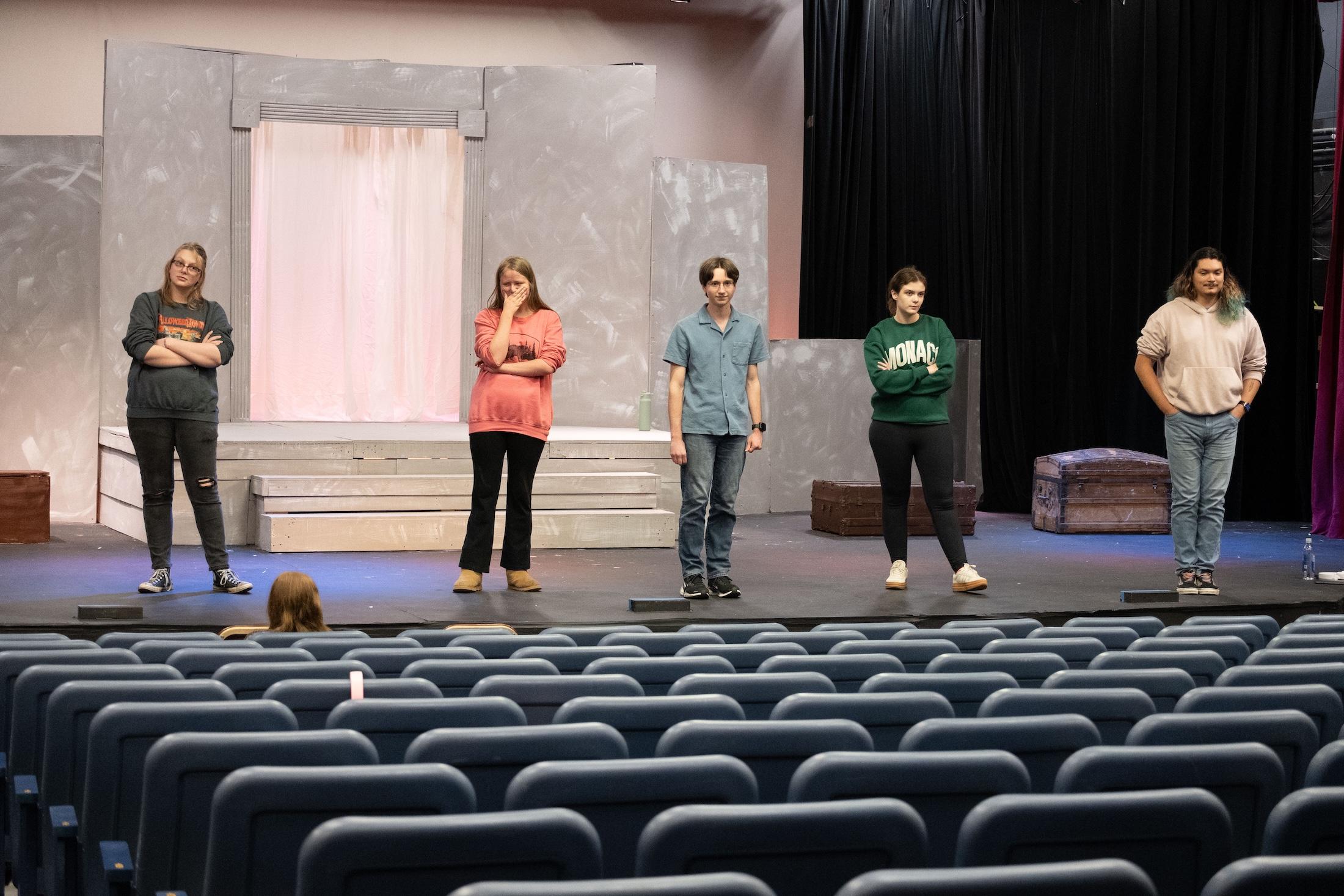student actors on stage for the performance for Medea
