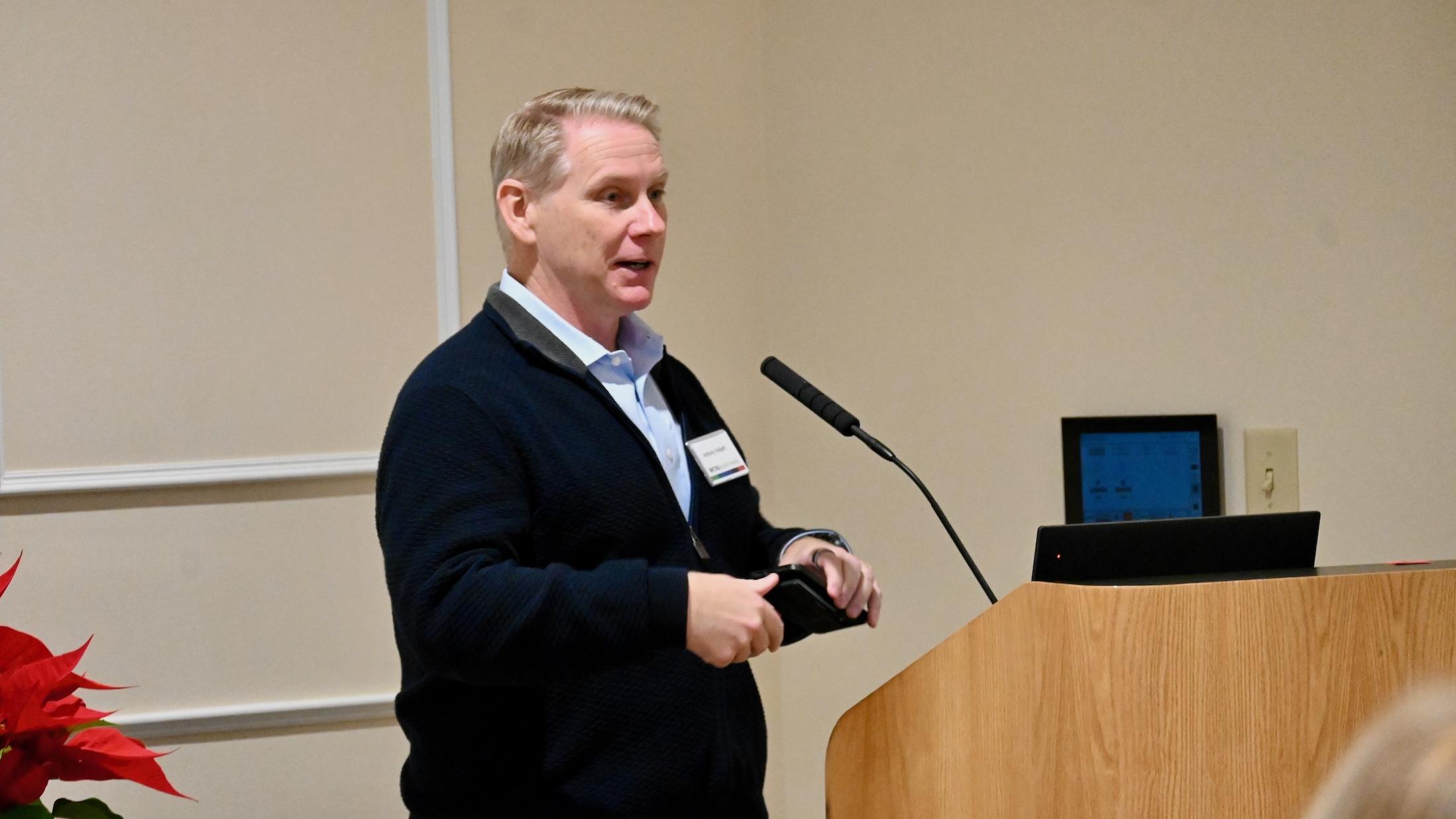 WOSU Anthony Padgett at a podium