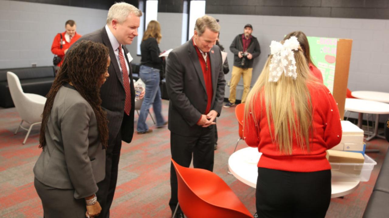 Lt. governor Jon Husted talking to a group of people