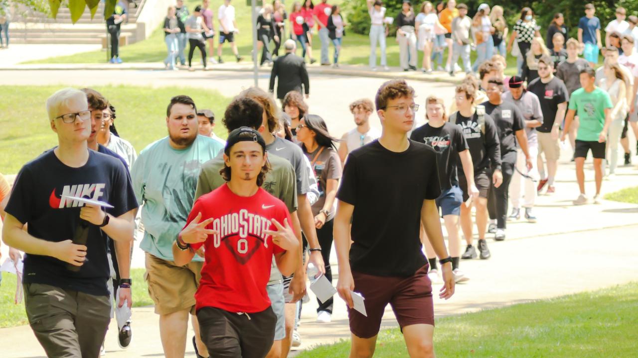 large group of students walking outdoors